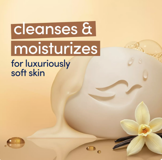 A creamy off-white cleanser or moisturizer bar with a serene face design, shown with text reading 'cleanses & moisturizes for luxuriously soft skin' on a warm beige background, with a vanilla flower and vanilla beans as props. A box of Dove Indulge Moisturizing Cream beauty bar, shown standing upright with a single bar of soap and a small pile of lather in front, on a warm beige background with abstract leaf shapes. Purchase from www.americanbodycare.co.uk