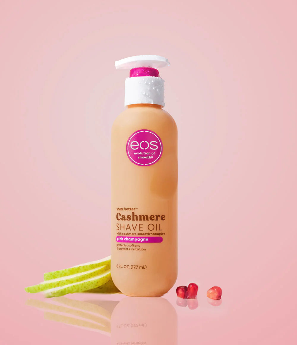 EOS Cashmere Shave Oil bottle on a pink background. Purchase from americanbodycare.co.uk