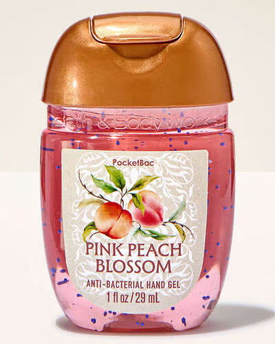Hand gel bottle with pink peach blossom design on a white background purchase from americanbodycare.co.uk