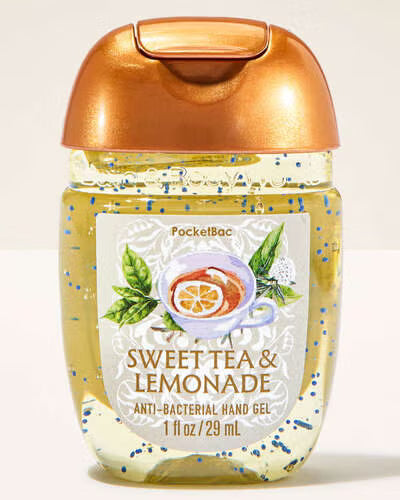 Hand gel bottle labelled 'Sweet Tea & Lemonade' with a gold cap on a light background. Purchase from americanbodycare.co.uk 