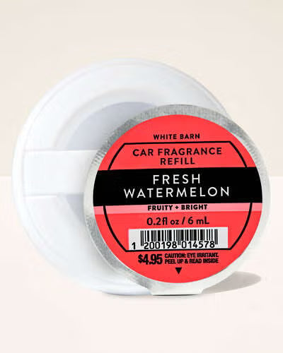 White car fragrance refill with a red label on a beige background. Purchase from www.americanbodycare.co.uk 