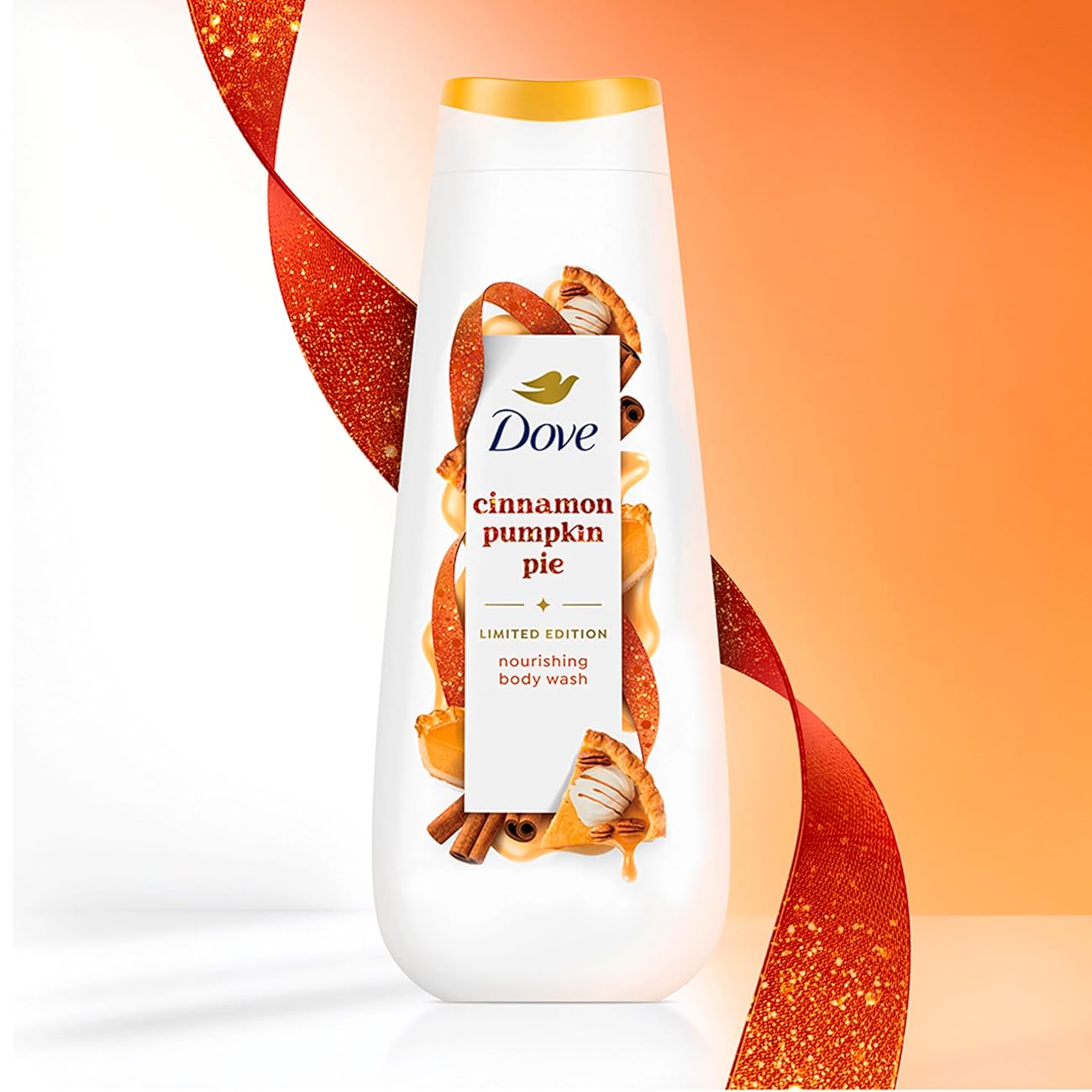 Dove Cinnamon Pumpkin Pie body wash bottle with a decorative ribbon on an orange background. Purchase from americanbodycare.co.uk