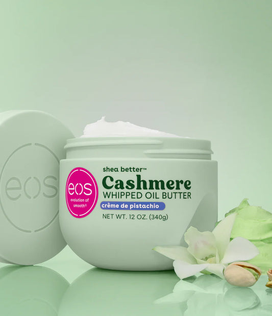 Eos Cashmere Whipped Oil Butter jar on a light green background. Purchase from www.americanbodycare.co.uk 