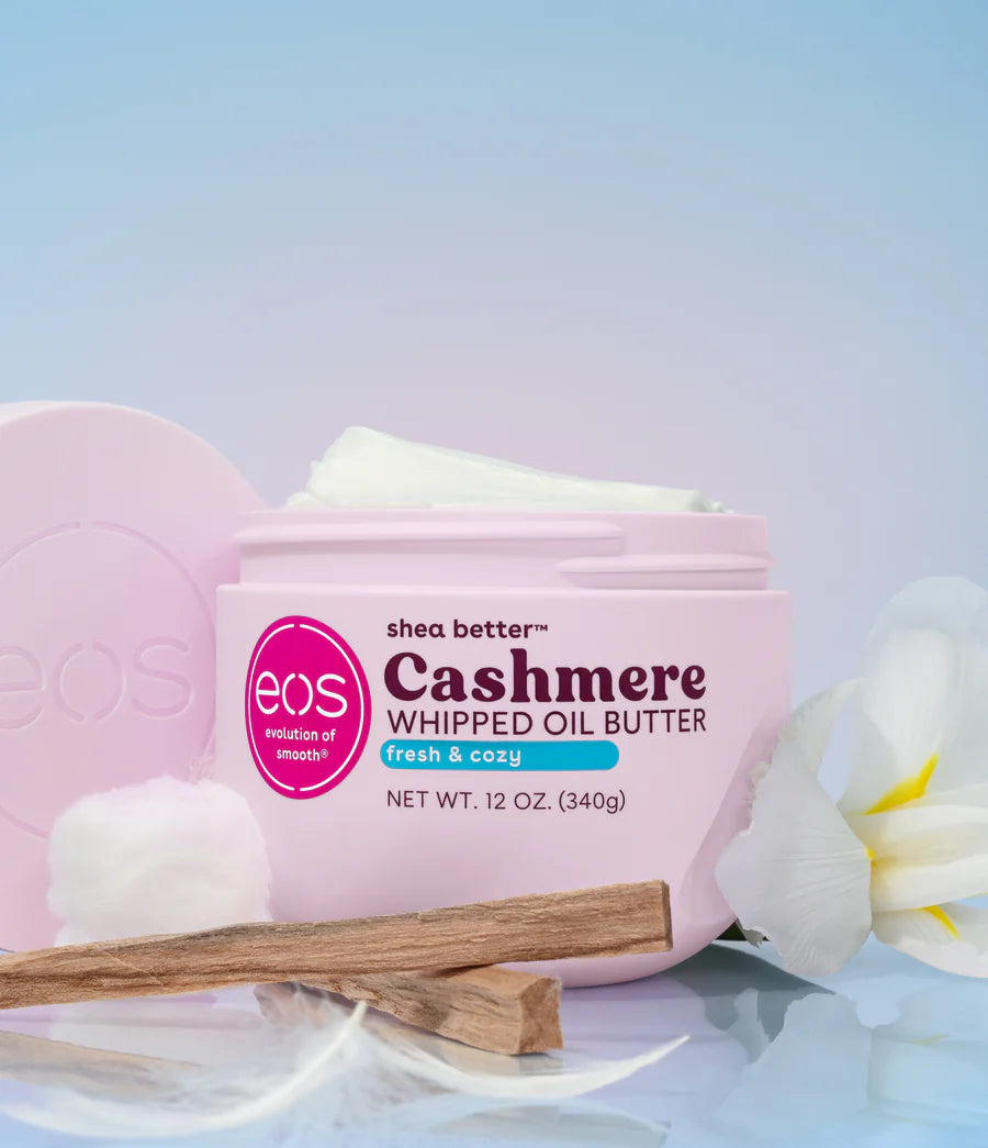 Shea butter cashmere whipped oil butter container with a pink lid on a light blue background. Purchase from www.americanbodycare.co.uk 