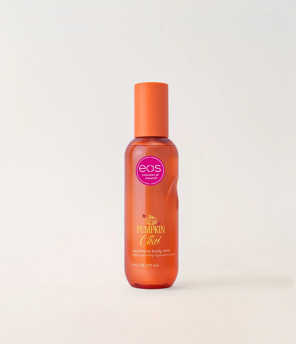 A bottle of EOS Pumpkin Chai cashmere body mist with an orange cap and orange-tinted bottle, set against a plain light background. purchase from www.americanbodycare.co.uk