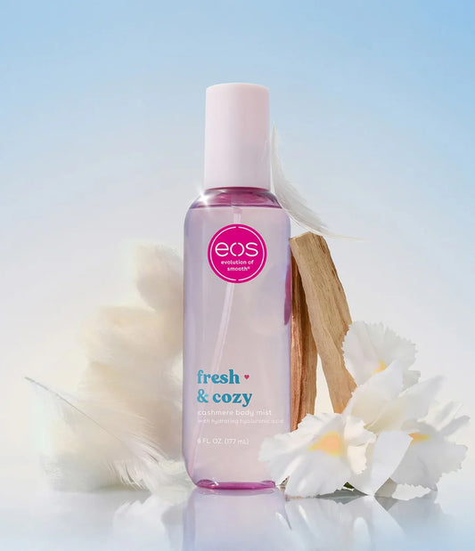 EOS fresh & cozy bottle with flowers on a light background. Purchase from americanbodycare.co.uk 