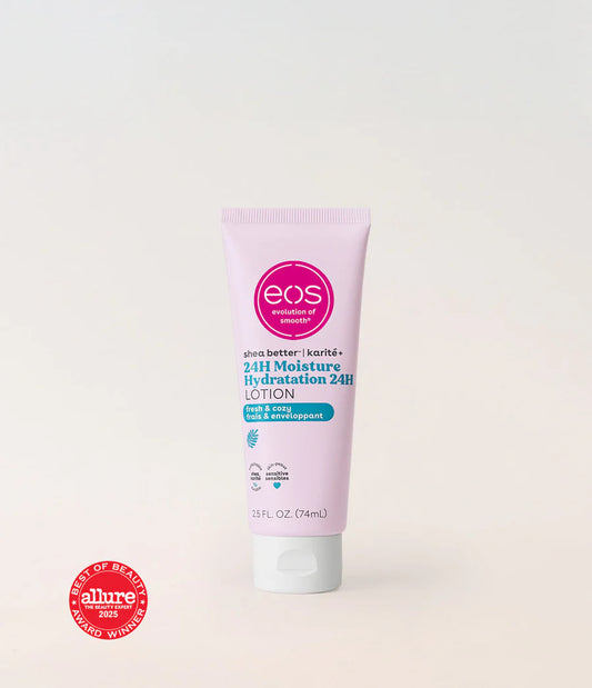 A tube of EOS Skincare 24H Moisture Lotion in a pale pink color with a white cap, set against a plain off-white background. A red 'Best of Beauty Allure 2023 Winner' badge is visible in the bottom-left corner. Bright morning glow, juicy dewy cassis, and subtle sheer musk come together to create a light, breezy fragrance — soothing, warm, and naturally fresh.