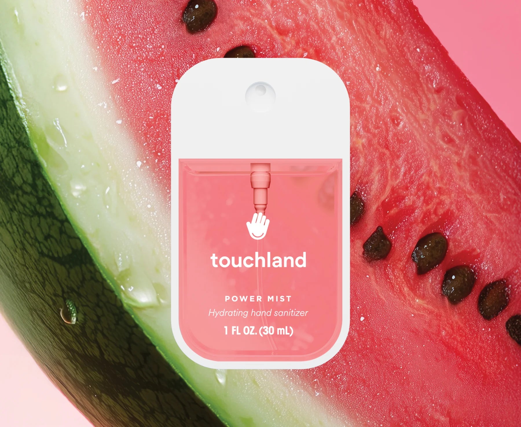 Touchland hand sanitizer packet on a watermelon slice with a pink background. Purchase from americanbodycare.co.uk