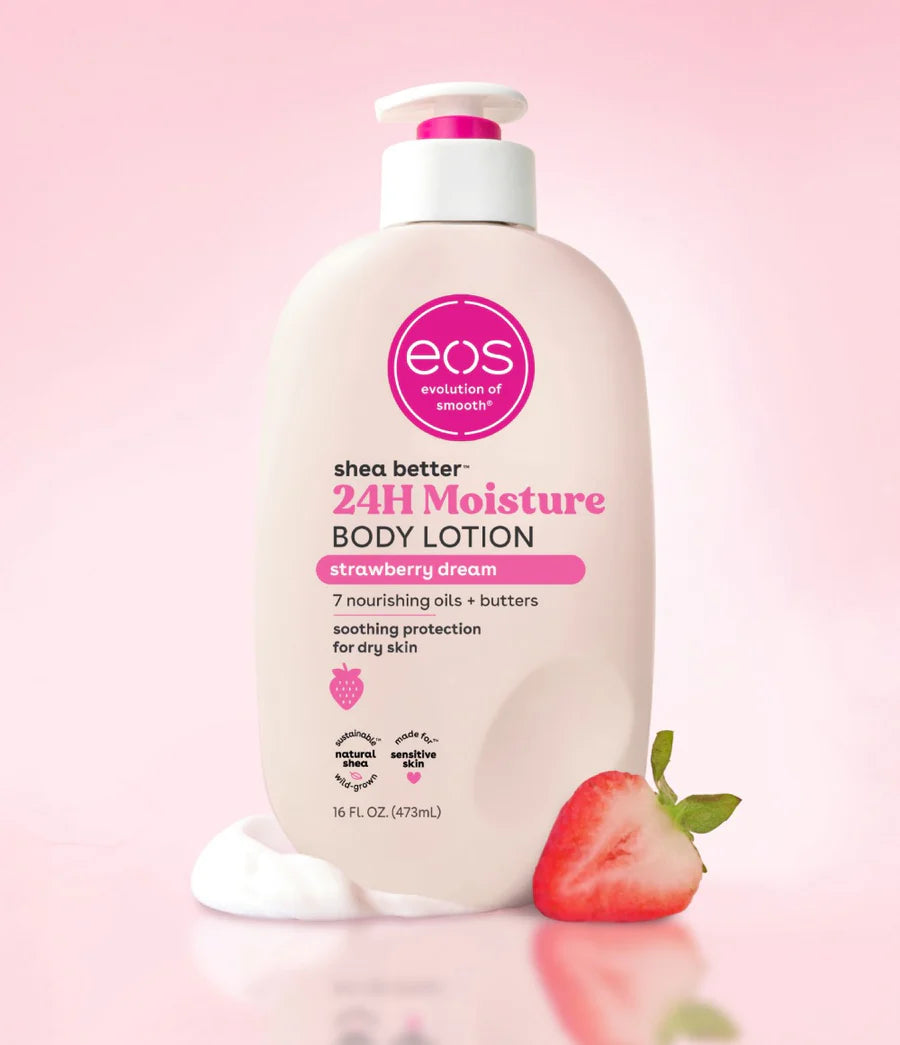 EOS strawberry dream body lotion on a pink background with a strawberry. Purchase from americanbodycare.co.uk 