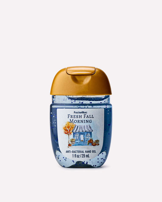 Pocketbac Fresh Fall Morning anti-bacterial hand gel in a 1 fl oz blue plastic bottle with a gold cap, on a light gray background. Purchase from www.americanbodycare.co.uk