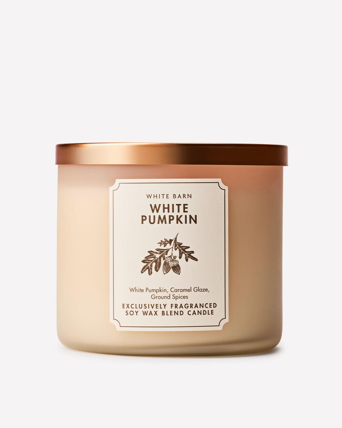A White Barn White Pumpkin scented soy wax candle in a frosted glass jar with a metallic copper lid and a cream-colored label, set against a plain light gray background. Purchase from www.americanbodycare.co.uk