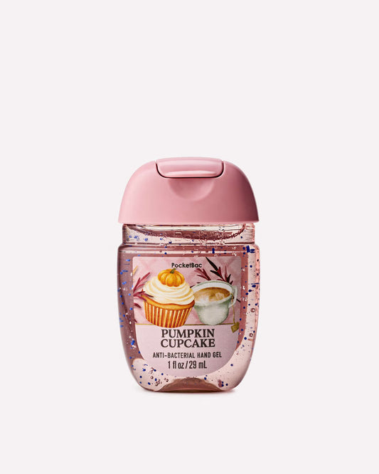 Pocket the Brand Pocket Hand Gel in Pumpkin Cupcake scent, featuring a pink cap and a clear bottle filled with pink glitter gel, shown on a light gray background. purchase from www.americanbodycare.co.uk