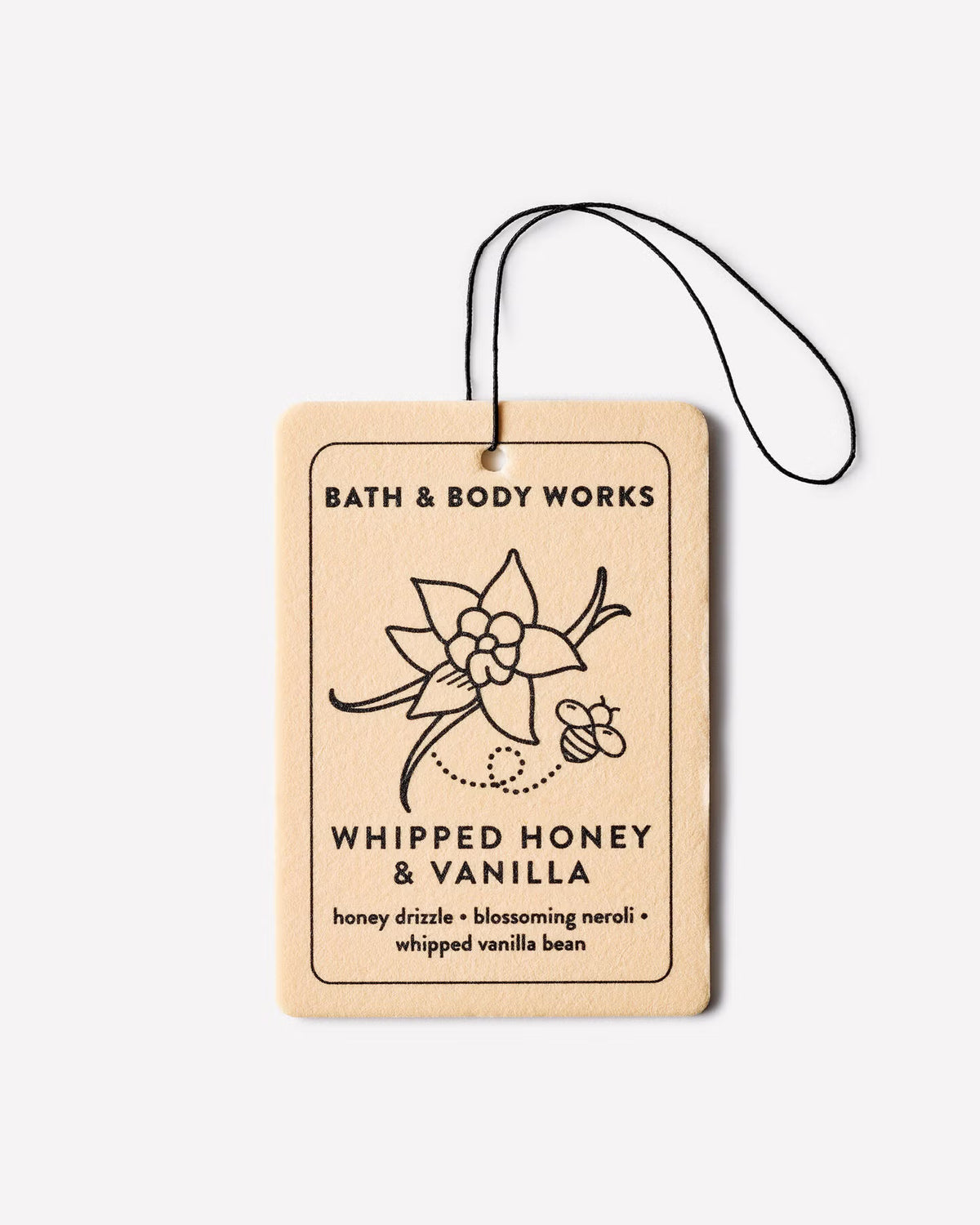A rectangular wooden Bath & Body Works Whipped Honey & Vanilla fragrance tag with a black hanging string, shown on a clean white background. Purchase from www.americanbodycare.co.uk